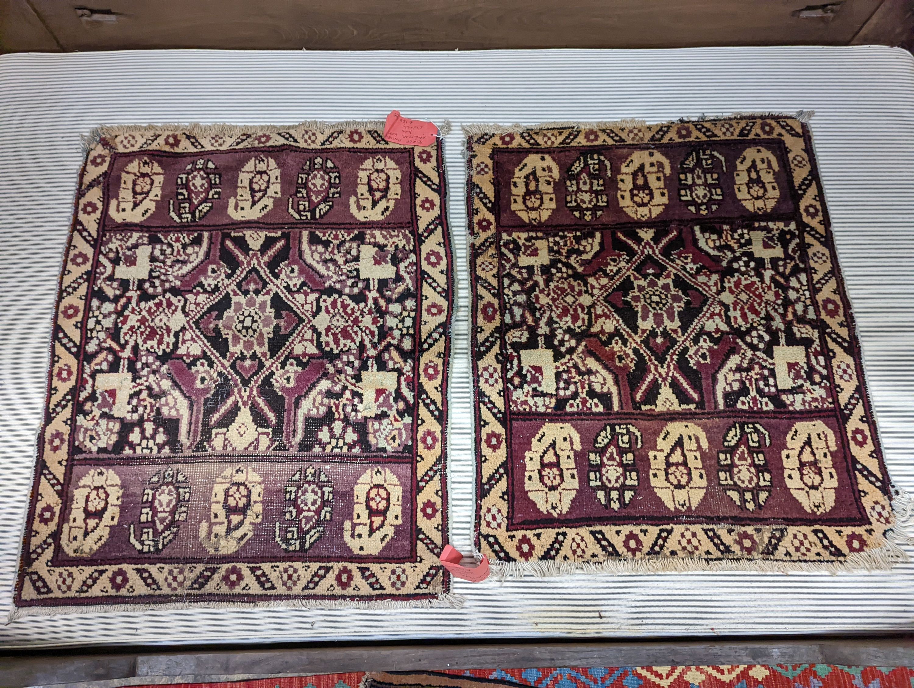 A pair of antique Amritzar rugs, 81 x 66cm
